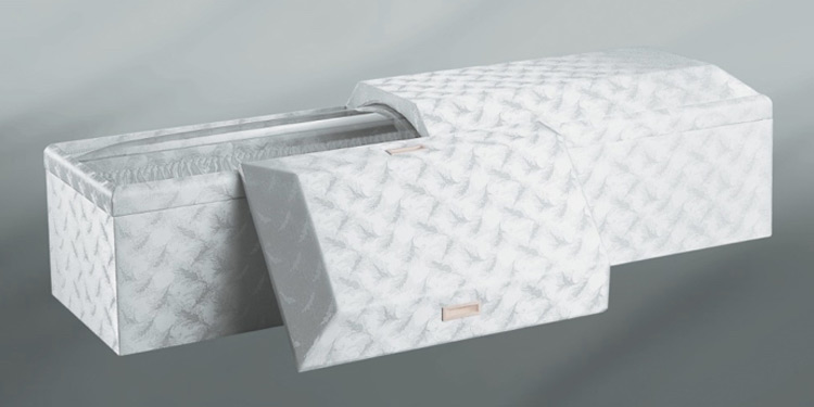 葛飾区メモリーホーム新小岩の棺の写真。白地にシンプルで機能的なデザインの棺。