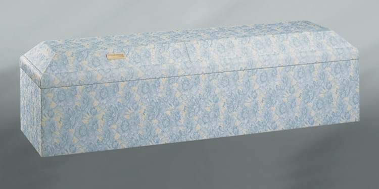 葛飾区メモリーホーム新小岩の棺の写真。青地にやわらかな模様が施された棺。