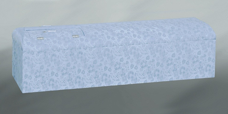 葛飾区メモリーホーム新小岩の棺の写真。青地に洗練された模様が特徴の棺。