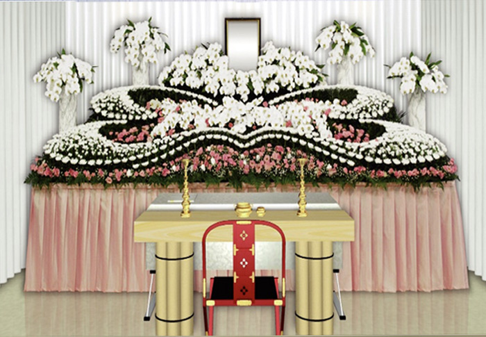 葛飾区メモリーホーム新小岩の祭壇の写真。ピンクと白の花が柔らかい雰囲気を演出した祭壇。